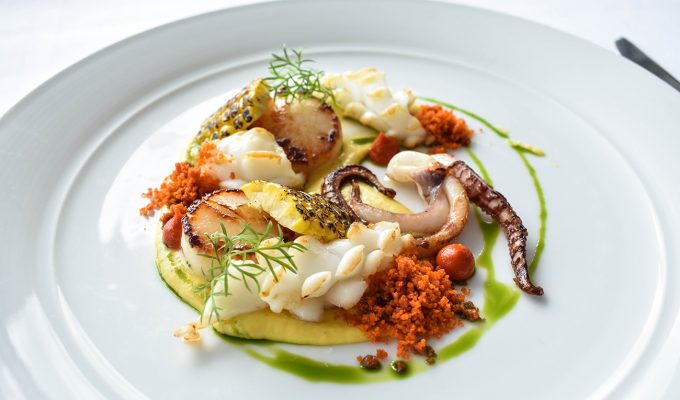 Cover pan seared scallops, squid, chargrilled corn.
