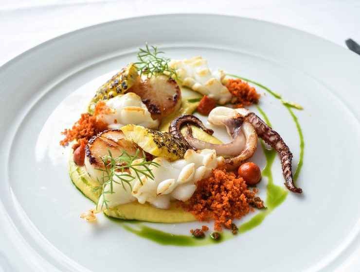 Cover pan seared scallops, squid, chargrilled corn.