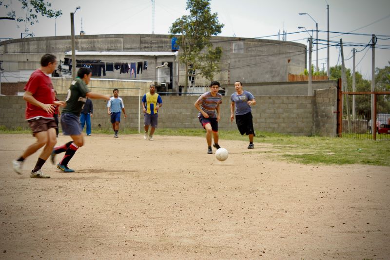 Children playing football uruguayan traditions