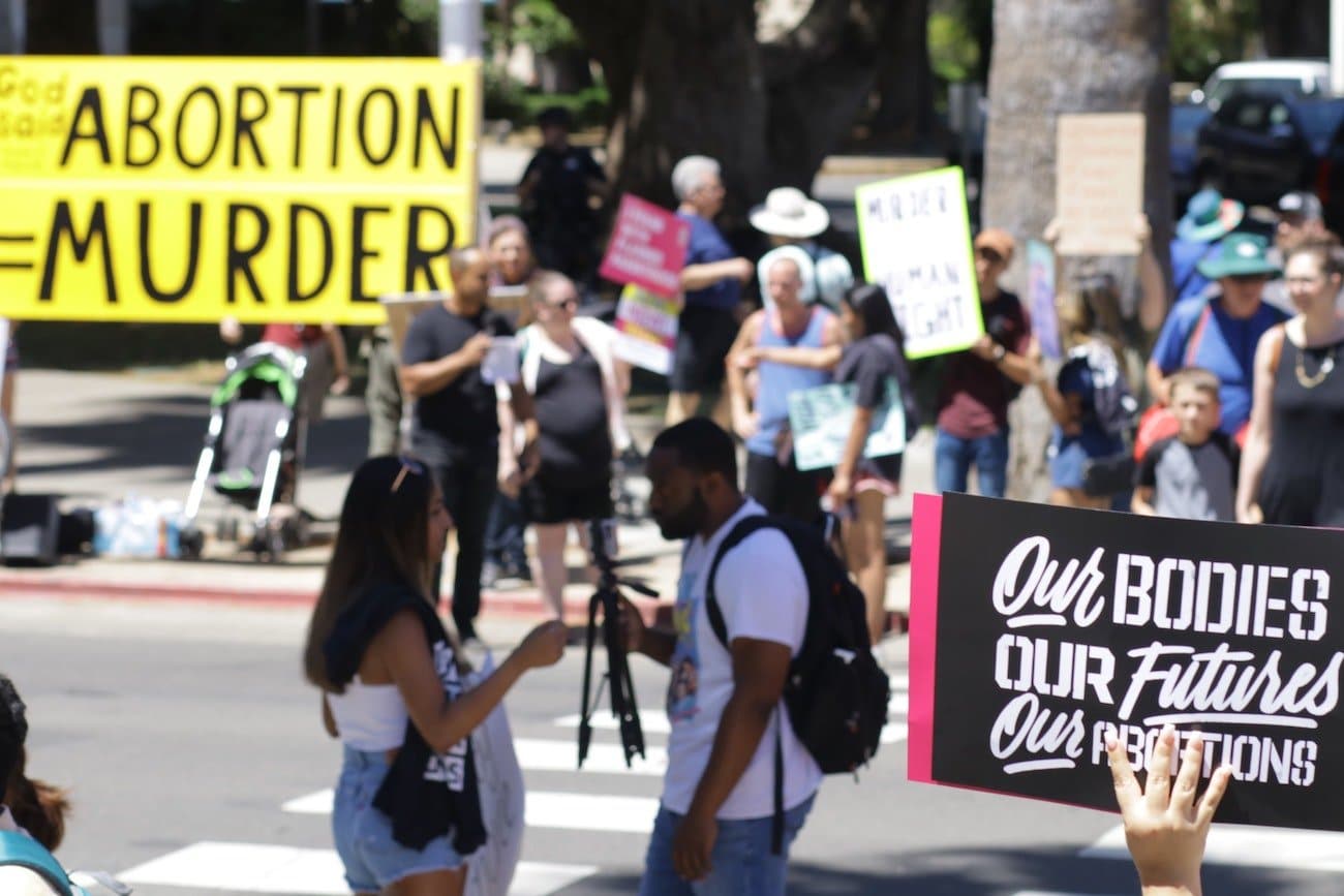 Understanding What The Overturning Of Roe v. Wade Actually Means. Photo by Aiden Frazier on Unsplash