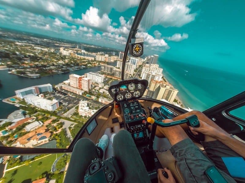 riding a helicopter over Miami