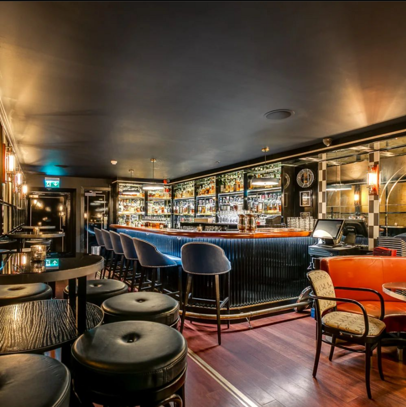 Seating area at Swift cocktail bars london 