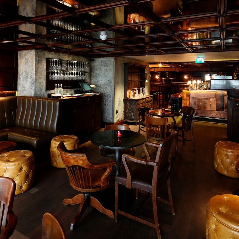 Seating area of Blind Pig Speakeasy Bars In London