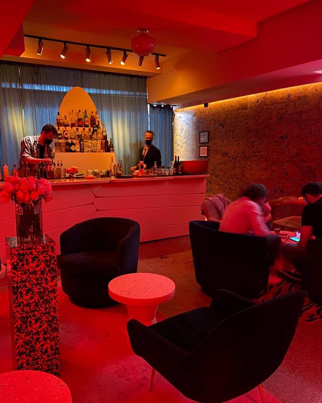 Red tinged interior of La Noxe 